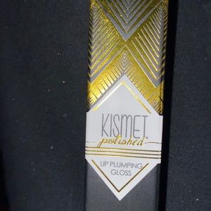Kismet lip plumping gloss in baby